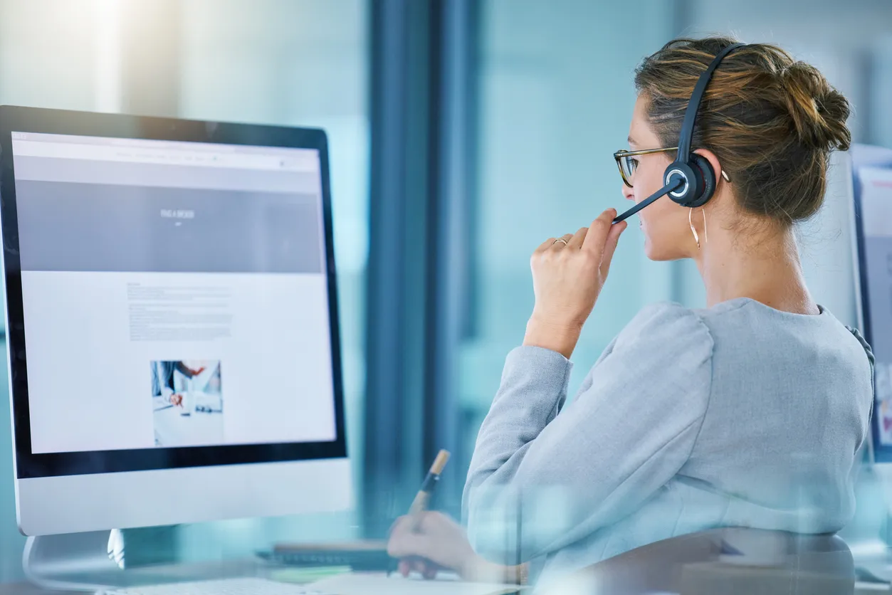 IP desk phone and headset on a Sydney office reception desk running 3CX