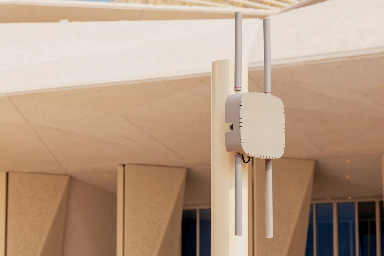 Business Wi-Fi access point mounted in a modern Sydney office ceiling