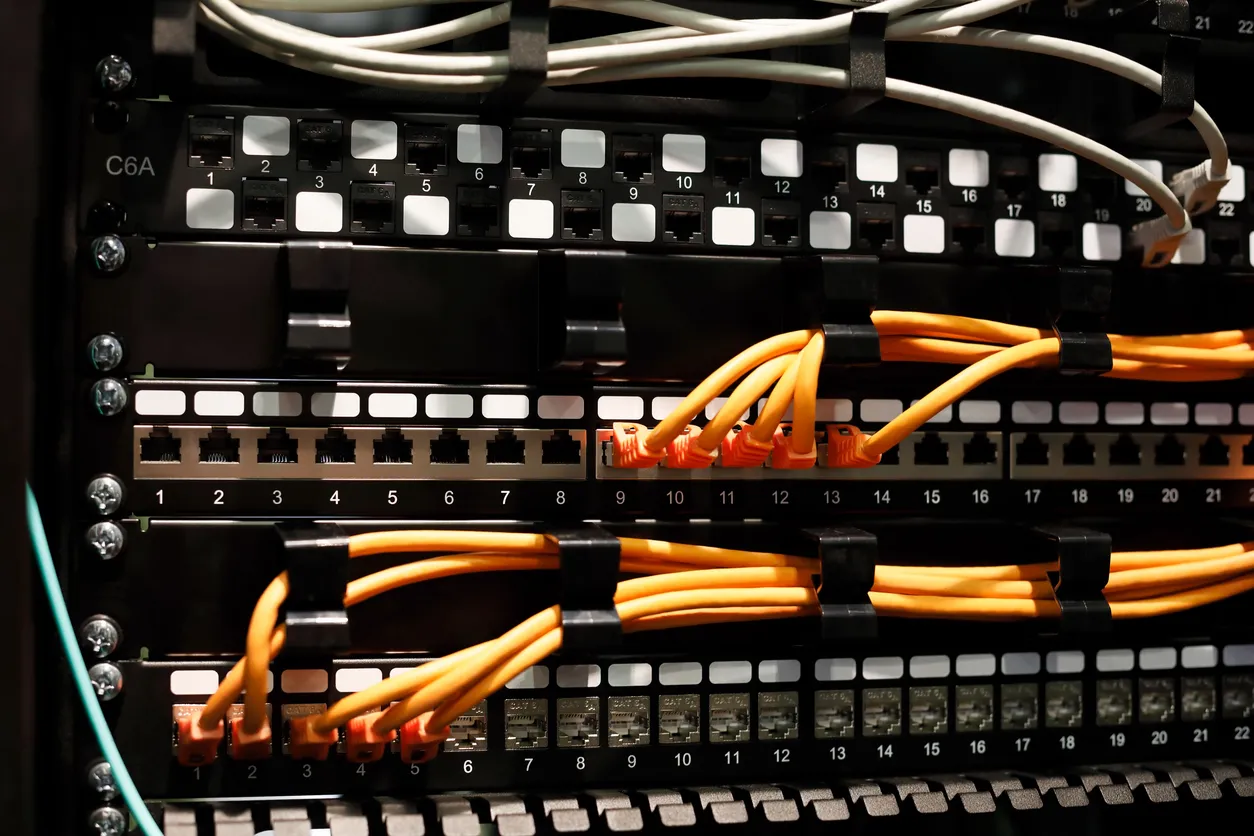 Network cabling and a wireless access point shown together in a Sydney office ceiling
