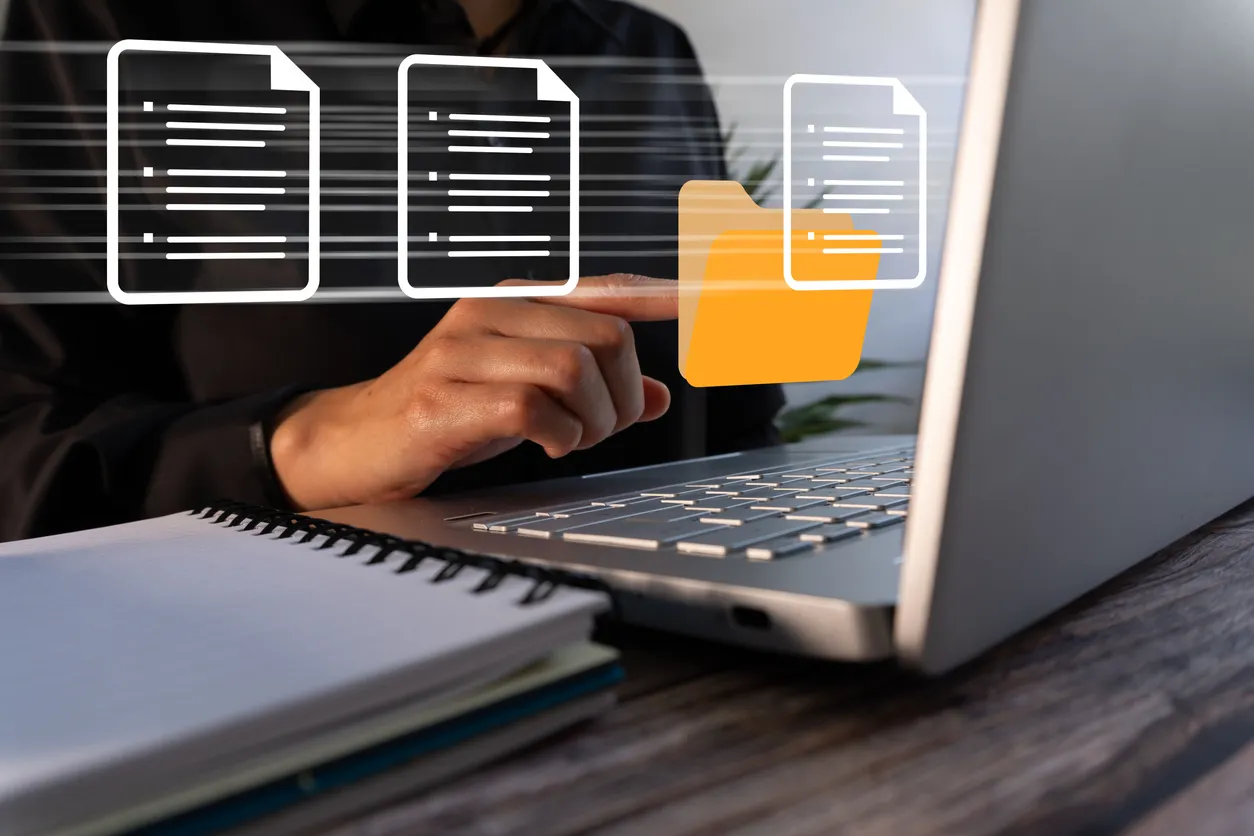 Office laptop showing a structured document library on a Sydney business desk