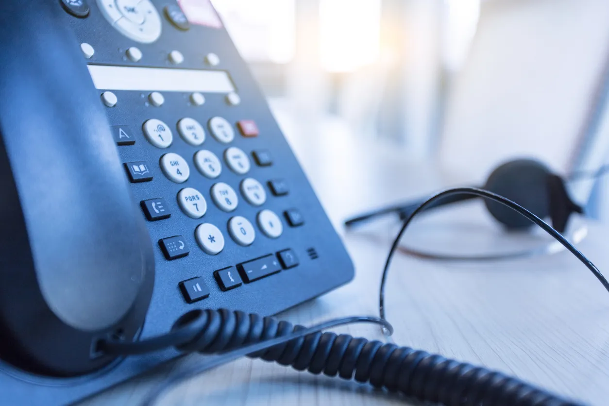 Network equipment and a desk phone in a Sydney office representing SIP trunking