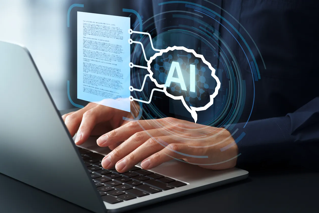 Small business laptop on a desk showing an AI assistant drafting a document