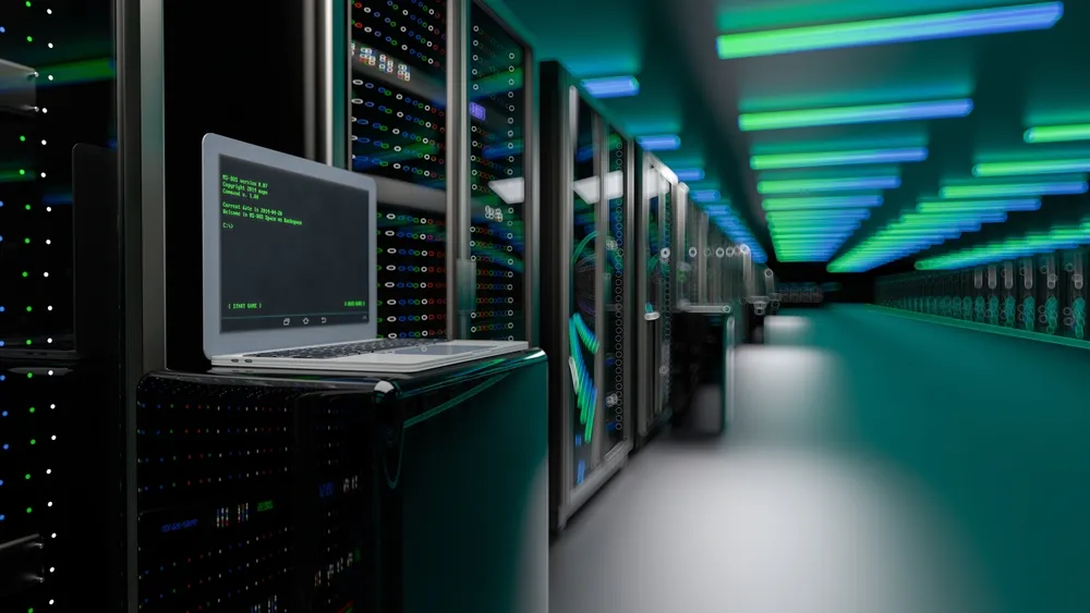 Rack mounted and tower business servers in an office comms room.